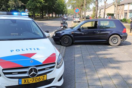 Botsing tussen auto en scooter aan de Groenewoudlaan Waalwijk