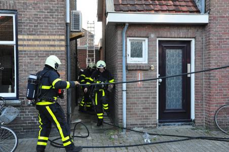 Tuinset in brand op dakterras aan de Sint Crispijnstraat Waalwijk