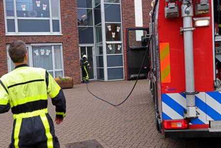 Rookontwikkeling in gebouw van Amerant aan de Lavengang Waalwijk